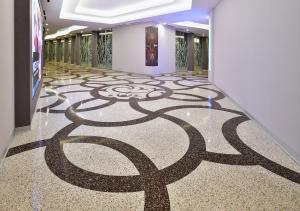 Curves in epoxy terrazzo design in the CityCenter Las Vegas casino foot bridge