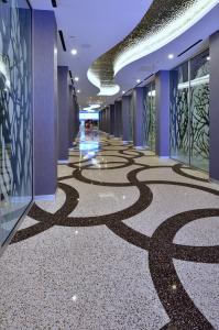 Epoxy terrazzo design in CityCenter Las Vegas casino footbridge.