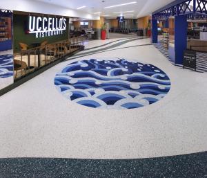 Artist George Eberhardt's epoxy terrazzo design for public art at Gerald R. Ford International Airport evokes water and Lake Michigan.