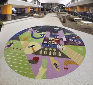 Artist Kim Nguyen's epoxy terrazzo design for public art: a medallion showing images indicating agriculture, manufacturing, and medical industries.