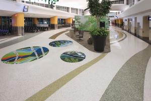 Michael Pfleghaar's epoxy terrazzo design illustrates the forests and farmlands of western Michigan. 