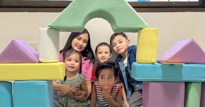 Kids and Teacher playing at a foam doll house at Able Plus Life Skills Development Center