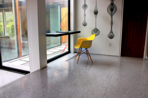 Terrazzo design: Gray terrazzo flooring in mid-century modern home design in Malibu, California
