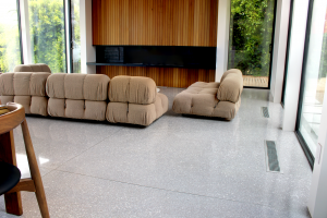 Terrazzo design: Mid-century Modern home design with monochromatic cementitious terrazzo.