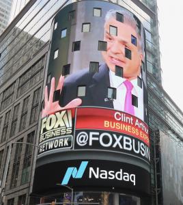 Financial advisor marketer Clint Arthur on the Nasdaq Jumbotron in Times Square, New York City