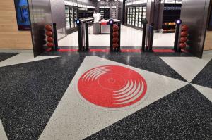 Terrazzo design: Red basket ball icon in a black and white terrazzo floor