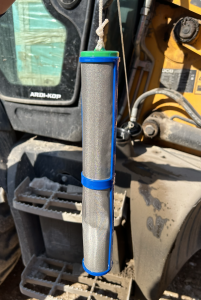 DQTube 2.0 from diesel excavator removing water from diesel fuel.