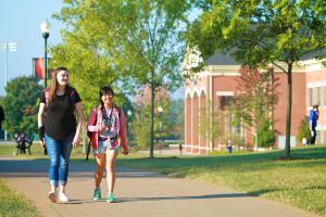 GWU Students walking outside of the Tucker Student Center