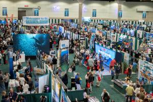 Overview of the Scuba Show floor with colorful booths and displays, including products, services and destinations.