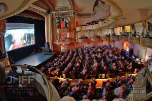 Image shows a full theatre at a screening at the Julien Dubuque International Film Festival. Credit Digital Dubuque