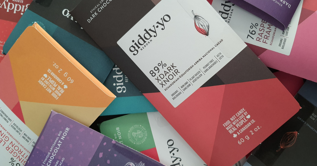 Colourful Pile of Giddy Yo wrapped Dark Chocolate Bars