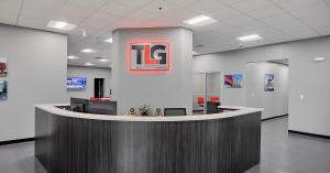 Lobby of Peterbilt dealership with TLG sign.