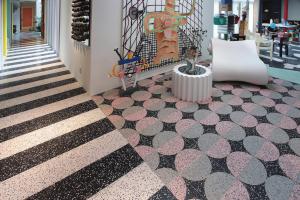Terrazzp design: 3d circles in terrazzo on the floor 