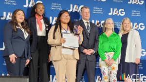 ACEE Board President Kris Anest and Board Members Julie Jakubek and Jason Koeller present JAG SMG Awards.