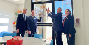 Torrance Mayor George Chen cuts the ribbon for the new Switzer Learning Center Elementary School, joined by Barbara Graham from Torrance Refining Company, Assemblymember Al Muratsuchi, and CEO Jeremy Deming, marking a significant milestone in special educ