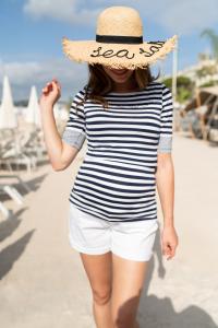 Lovell is a nautical navy and white striped maternity and nursing top with short sleeves