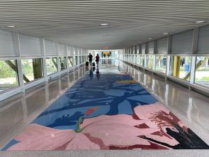 Terrazzo design, terrazzo public art: Foot bridge with terrazzo floor depicting hibiscus flowers.