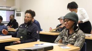 The trainees in the Electrical Level classes listen as they are introduced to their instructor as Lakitsha Rogers of Natchez Workforce Development distributes class information and syllabuses. Photo by Dillian West.