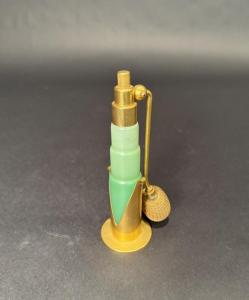 A stunning example of vintage craftsmanship, a DeVilbiss green opaline glass and gilt atomizer is estimated at $100-$200