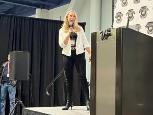 Elizabeth Nelson, founder of Snowmad Digital, speaking at Wedding MBA in Las Vegas.