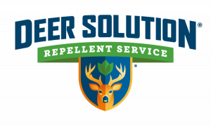 Deer Solution Repellent Service logo featuring bold blue text above a green banner, with a shield emblem displaying an orange deer head and green leaves between its antlers.