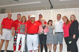 Winners of 2025 Arthur Adler Memorial Golf Challenge -- the Education Foundation of Palm Beach County -- accepting award