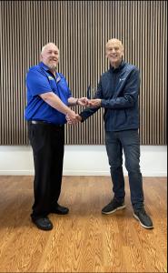 Mike Neal, VP-Sales Engineer receiving the Award from Todor Fay, CEO.