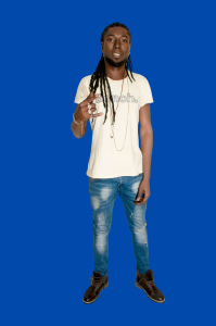 "Rast Dias, artist behind ‘MASH ROAD’ EP, styled in a cream Bench top, blue ripped jeans, and brown Doc Martens, standing against a bold blue background."
