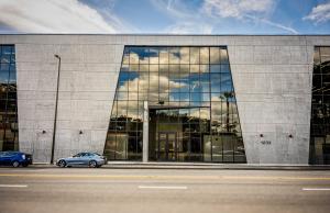 Front-facing image of the East End Studios Glendale building, featuring tall windows and concrete exterior.