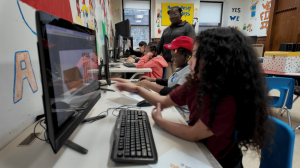 Children using ClassGaga AI learning system at the YMCA of Paterson while participating in the ClassGaga personalized math learning program