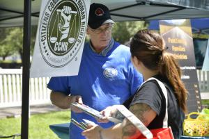 CCHR provides information on psychiatric drugs & parents rights to parents at Kids Day in the Park in Rancho Cordova.