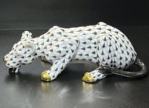 Large black porcelain drinking lioness by Herend (Hungary), with 24k gold accents (Estimate: $750-$900).