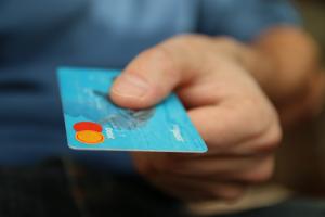 Person paying with a debit card