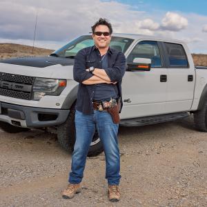 Dean Cain shows off a customized Superman Desert Eagle at his home in the Nevada desert.