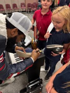 Artist with students