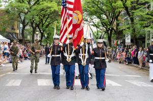 Solders carry the American Flag in front of the Memorial Day Parade in Kennett Square, PA