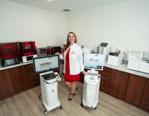 Cosmetic Dentist Dr. Radwa Saad, Founder of Dent Blanche Dental in her office