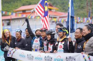 Race winners Team KBS of Malaysia on the finish line