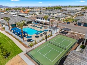 resort-style amenities including a sparkling swimming pool, a state-of-the-art fitness center, a pickleball court, walking trails and a large clubhouse.