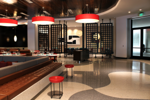 Terrazzo Design: gray and white curves in terrazzo, red lighting