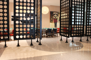 Terrazzo design: epoxy terrazzo floor in 70s style decor.