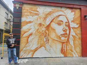 Ohlone female Indian with feathered headdress.
