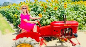 Katy sitting on a tractor