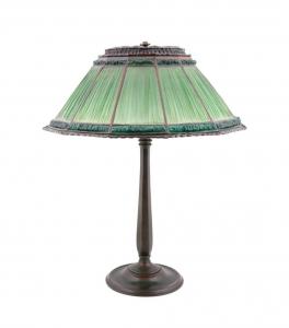 Early 20th century Tiffany Studios (American, 1880-1930) “Linen Fold” glass shade on 534 base table lamp, 23.75 inches tall, the shade 19.5 inches in diameter. Estimate: $10,000-$15,000