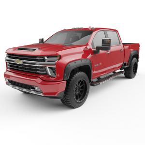 red truck with black fender flares
