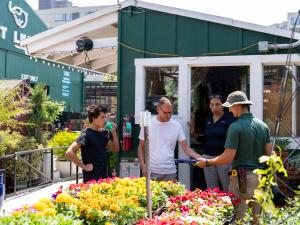 An Anawalt team member assists Garden Center customers