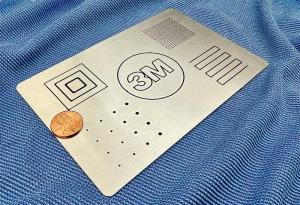 A sample piece shows the thin bond lines that can be achieved with 3M™ Scotch-Weld™ One-Part Epoxy Adhesives 6101 & 6102 when attaching and sealing parts.