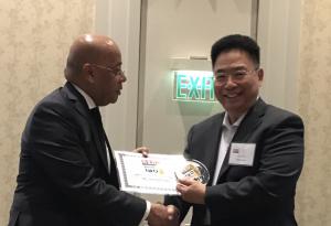 Robert Chen accepts award