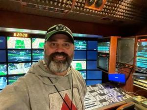 Chuck Slavin working broadcast on the TV truck in Boston