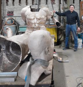 Sculptor Zenos Frudakis with bronze casts of his Muhammad Ali statue at the Laran Bronze Foundry in Chester, Pa.